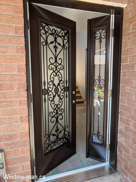 Front door ideas. Single entry insulated steel. One active operable sidelight. Front door with sidelight that opens. Brown. Port Stanly iron glass inserts